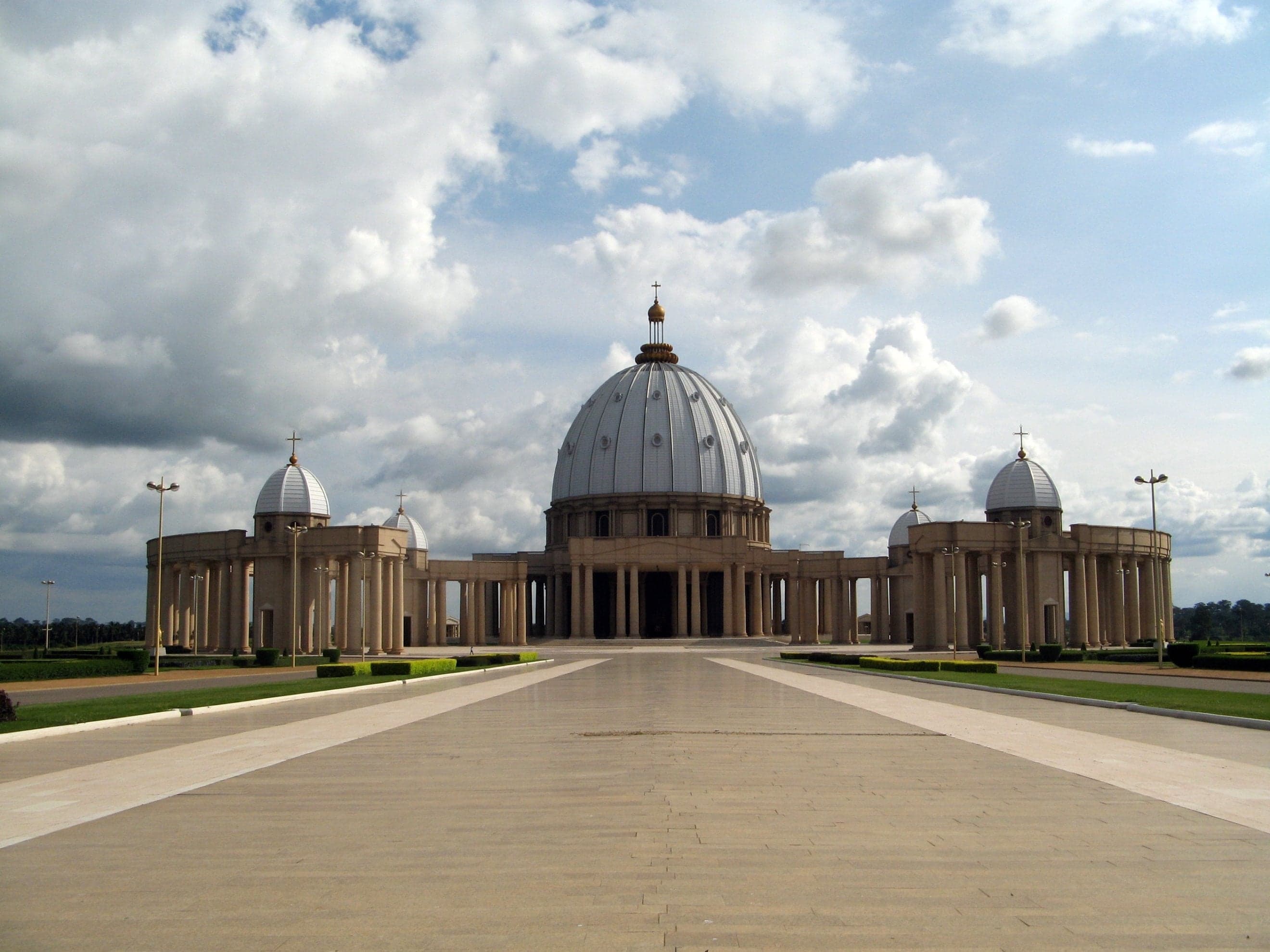 The huge domed Basilica of Our Lady of Peace in Yamoussoukro surrounded by green grounds