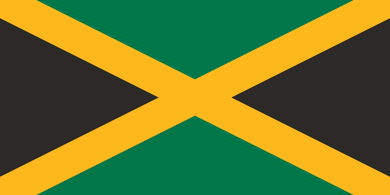 Jamaican sprinters celebrating on a running track, draped in Jamaican flags