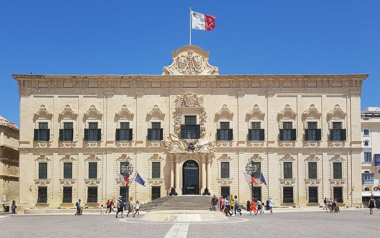 The honey-coloured limestone buildings of Valletta seen from the harbour