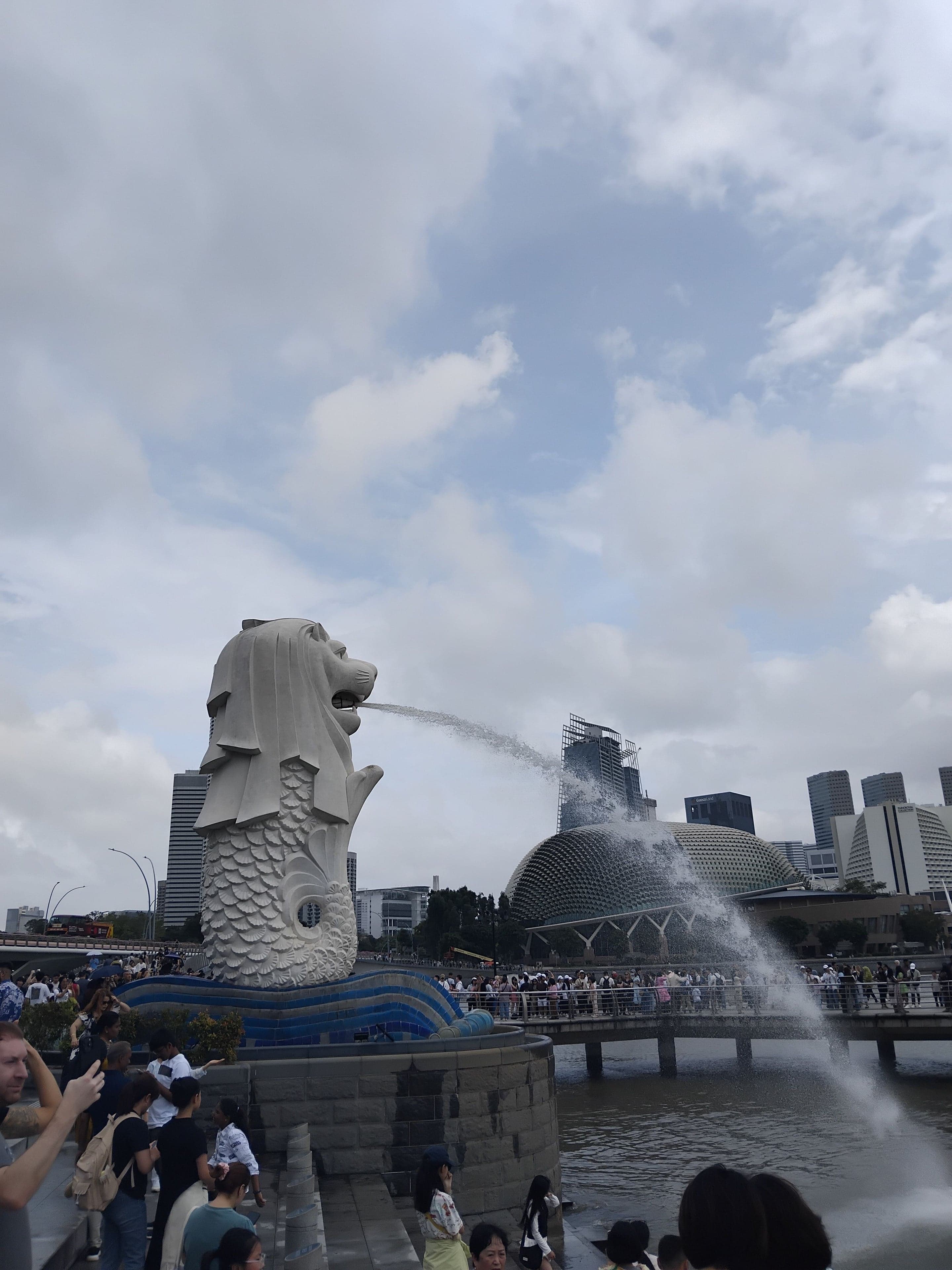 The Merlion statue spouting water at Merlion Park, Singapore