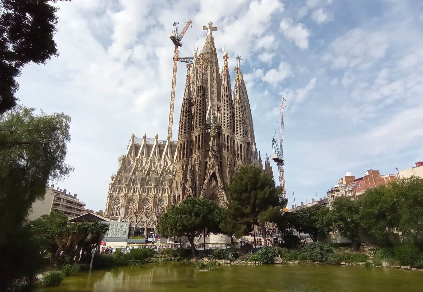 The towers of the Sagrada Família in Barcelona, with construction cranes still working on it