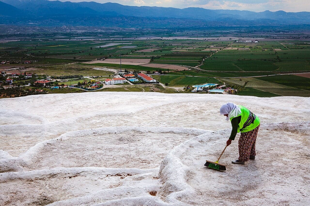 The white travertine terraces of Pamukkale with pools of blue water